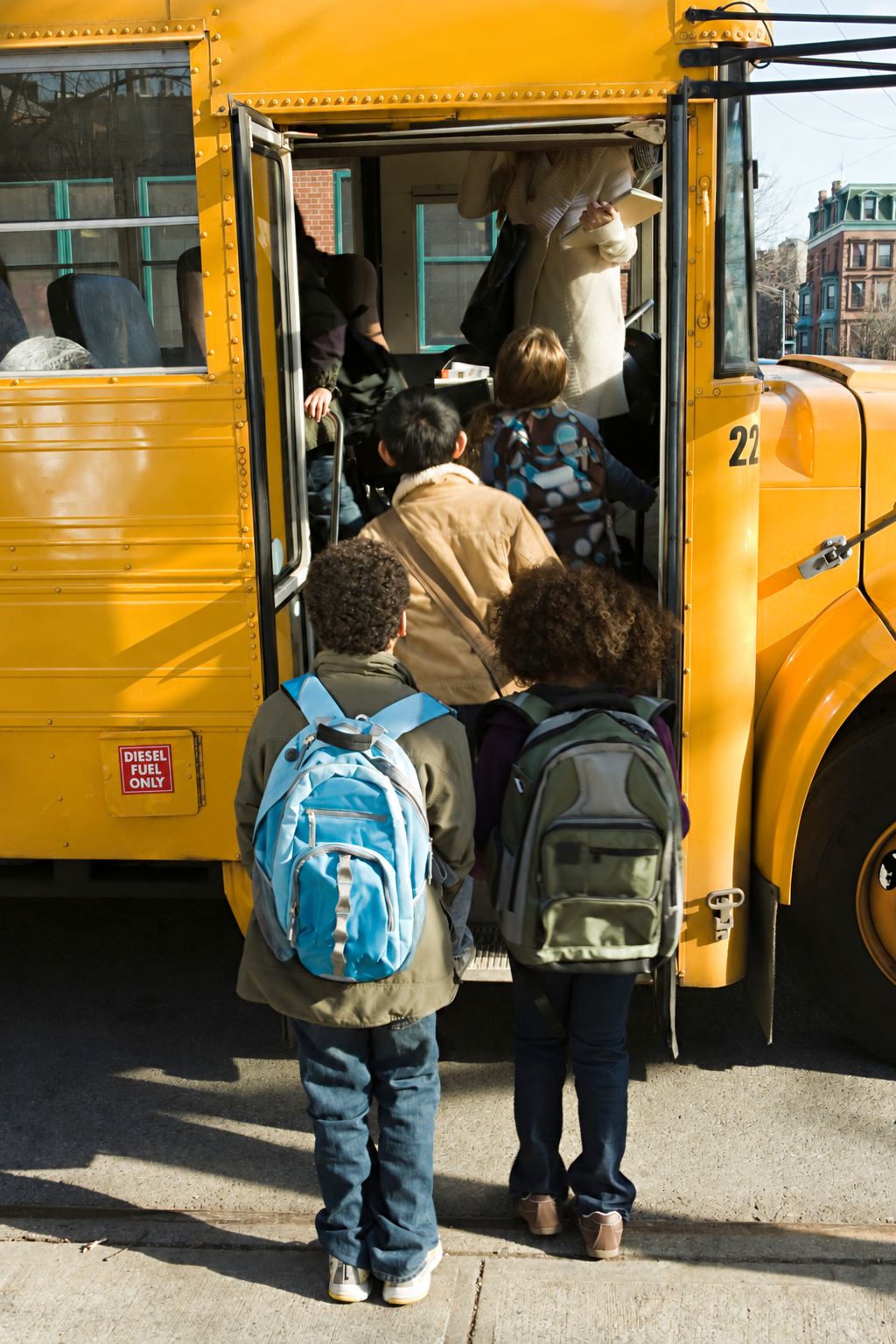 Yellow school buses parked and ready for student transportation in Niagara Falls